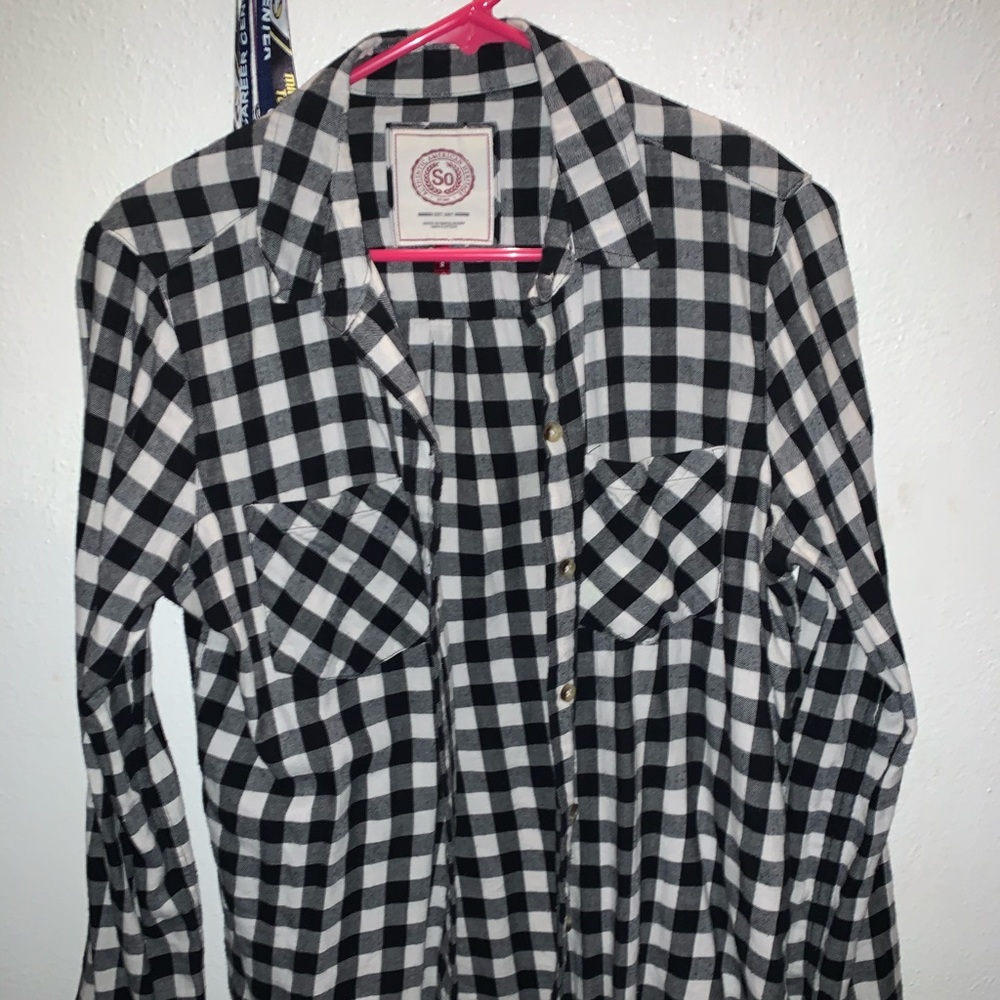 Black & white plaid long sleeve shirt.